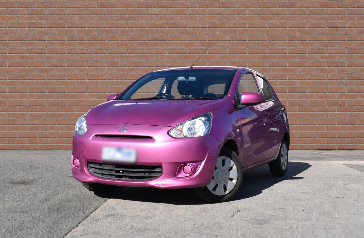 Image of a 2014 Mitsubishi Mirage LA ES Pink 5 Speed Manual Hatchback